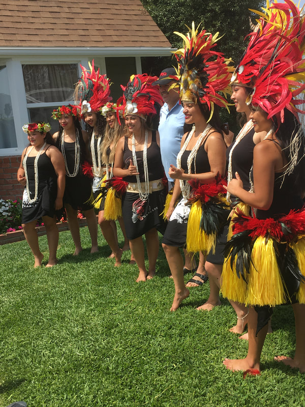 Hawaiian themed costume performers tropical party